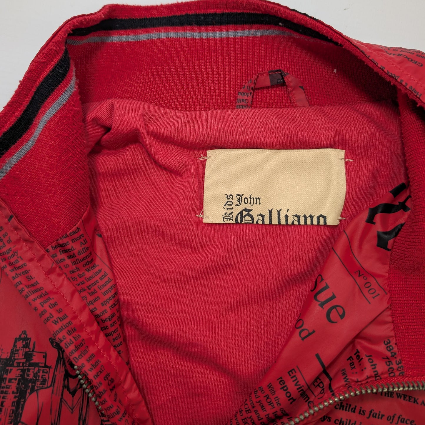 John Galliano jacket with "newspaper" monogram