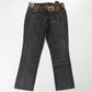 Jeans with multiple labels indicated "DG"