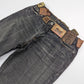Jeans with multiple labels indicated "DG"