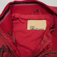 John Galliano jacket with "newspaper" monogram