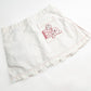 Mini jupe Chanel Sport Camelia S/S 2005 - L